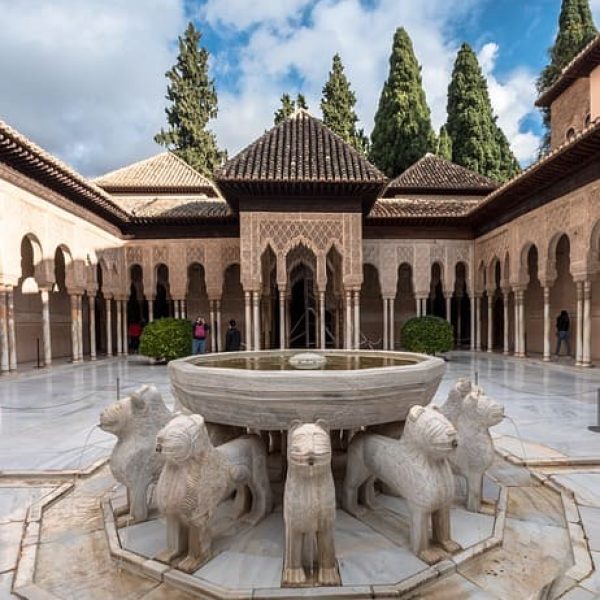 Marble lions around a fountain.